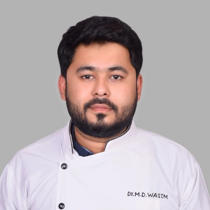 Dr. Md Wasim, prosthodontist and dental implant specialist at Happy Tooth Dental Care, Mohamadwadi, Pune