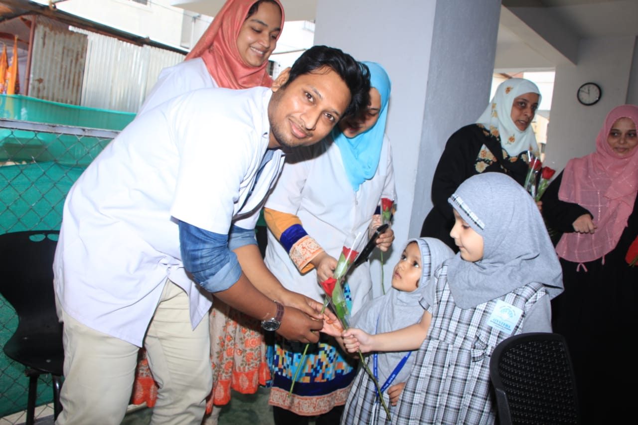 Happy family with the Happy Tooth dental team after treatment in Mohamadwadi, Pune